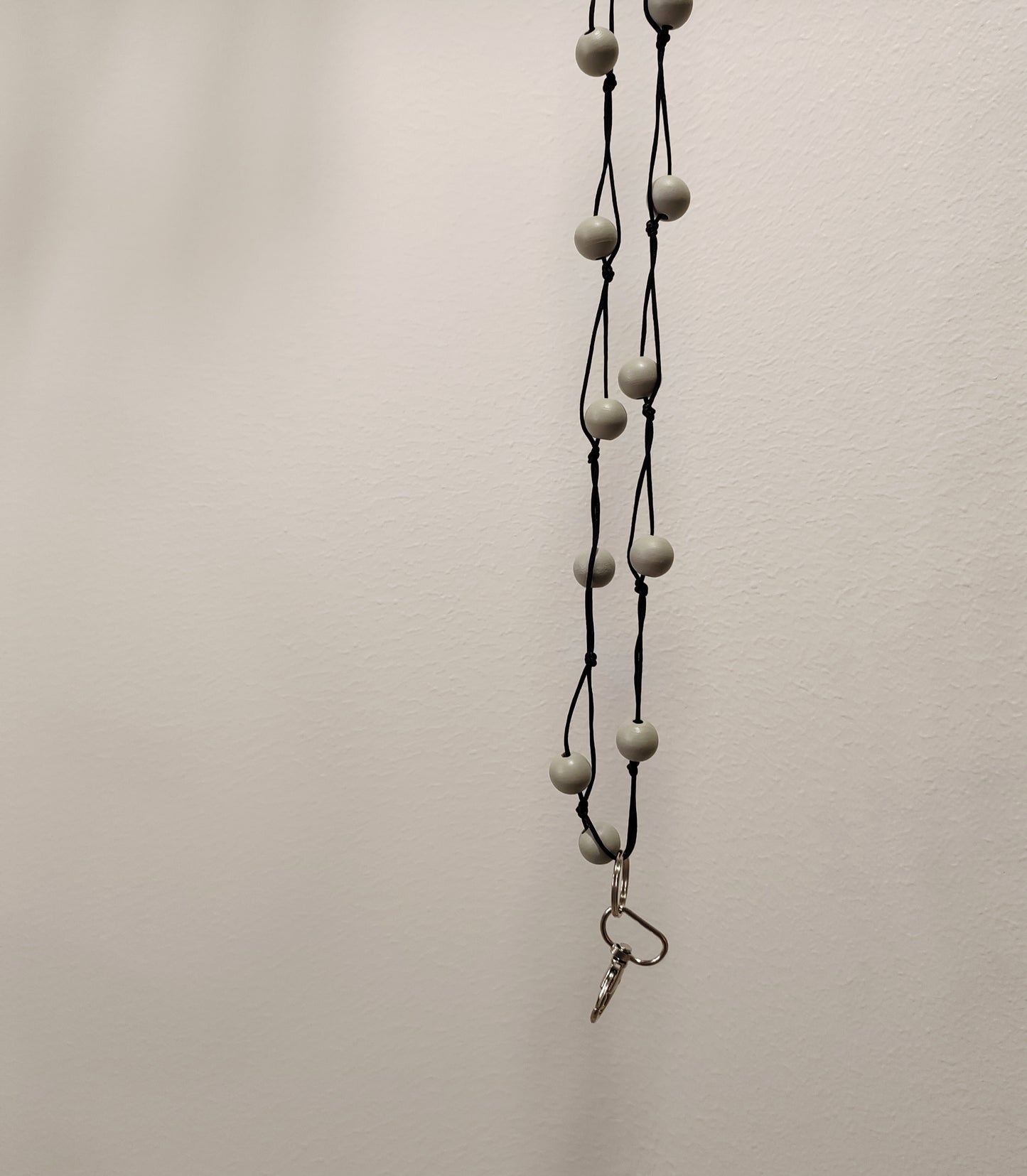 Olan yli avainnauhat (musta nauha)