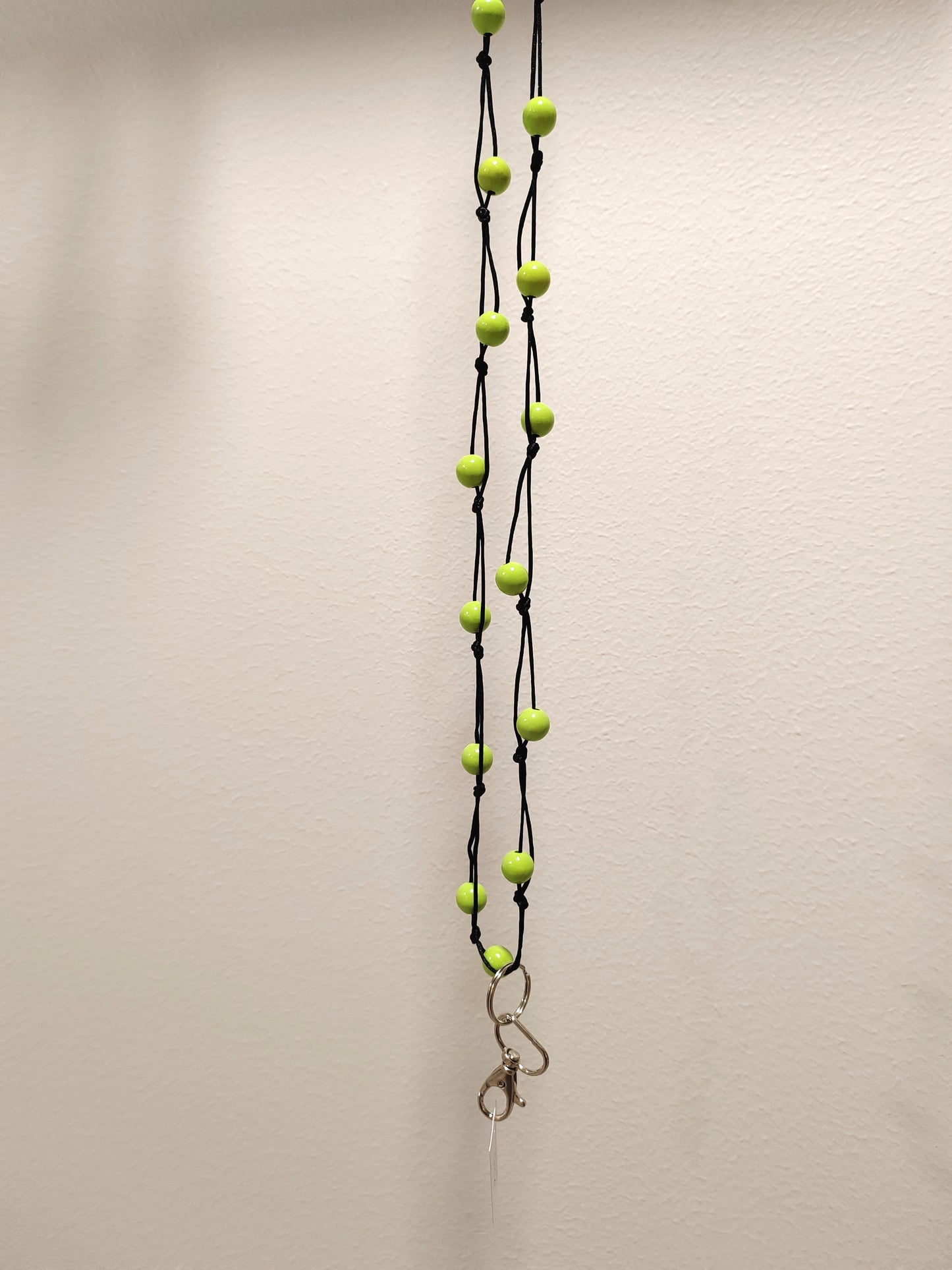 Olan yli avainnauhat (musta nauha)